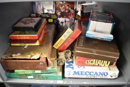 A shelf of vintage Games and Toys including Totopoly, Cluedo, Ludo, Chad Valley Scalado, Meccano