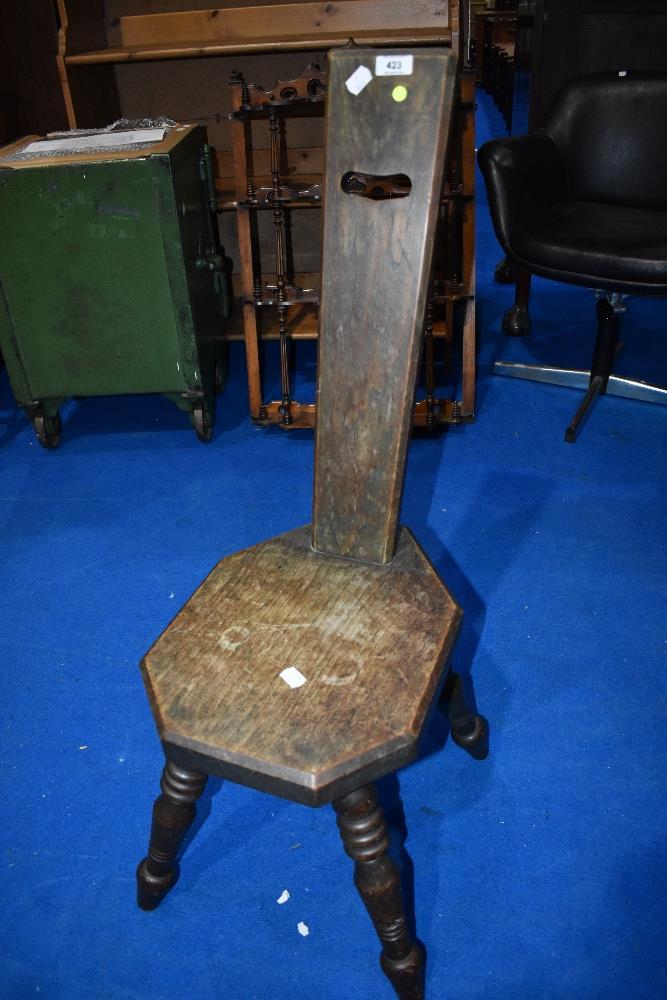 A traditional oak spinning chair