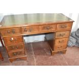 A reproduction Regency mahogany pedestal desk of typical design, approx. Dimensions W122 D61 H78cm