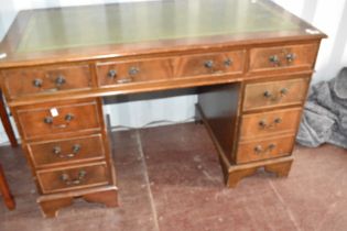 A reproduction Regency mahogany pedestal desk of typical design, approx. Dimensions W122 D61 H78cm