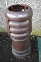 A glazed chimney pot