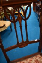 An Edwardian mahogany carver chair