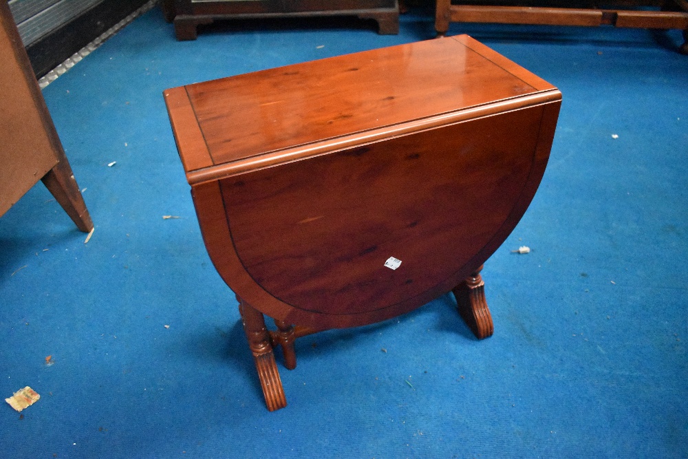 A reproduction yew wood gateleg occasional table, width approx. 48cm