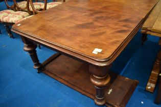 A Victorian windout dining table , approx 122 x 159cm, plus two additional leaves and winder