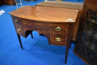 A Regency revival mahogany bow fronted kneehole desk or dressing table, approx width 103cm