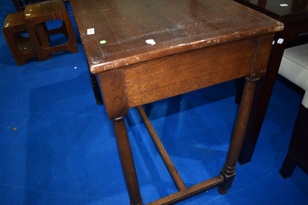 A traditional oak side table on turned H frame, approx 99 x 48cm, height 81cm - Image 2 of 2