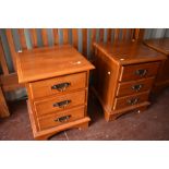 A modern hardwood headboard (w161cm) and two similar bedside chests