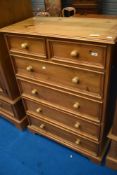 A modern pine chest of two over three drawers, dimensions approx. H123 W91 D47cm, one drawer damaged