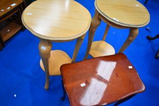 Two modern light stain plant stands and a dark occasional table in continental style