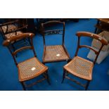 Three (two plus one) cane seated chairs of 19th Century design