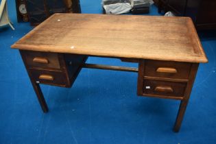 An early 20th Century oak office desk, approx. 136 x 75cm