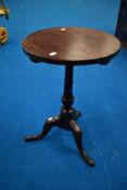 A 19th Century mahogany pedestal occasional table having later top on turned column, diameter approx