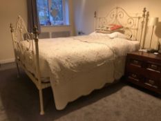 A cream metal and brass bed frame (base mattress and bedding not included), width approx 135cm