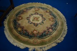 A Chinese rug of circular form, approx diameter 150cm