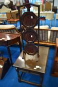 An early 20th Century mahogany cake stand and a vintage oak coffee table (table approx 51 x 65cm)