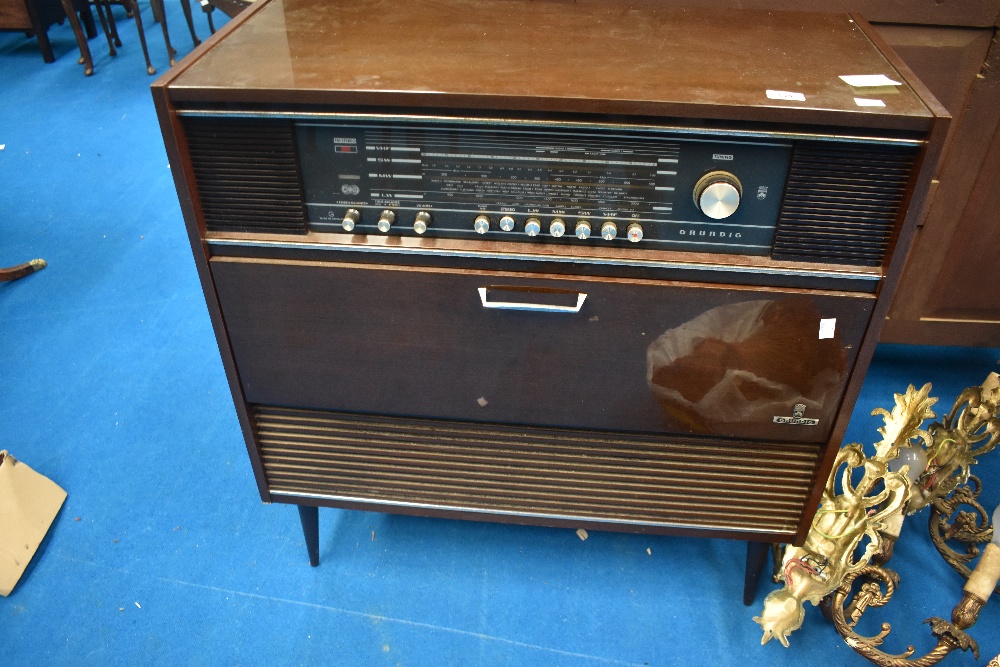 A vintage Grundig radiogram and selection of LP records