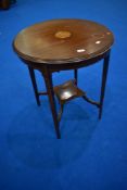 An Edwardian mahogany occasional table having inlaid top (af), diameter approx 62cm