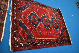 A Persian rug, labelled Eastern Kayam Co, Hamadan, approx 2.03 x 1.50cm