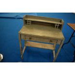 An Arts and Crafts style limed oak desk or washstand