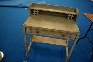 An Arts and Crafts style limed oak desk or washstand