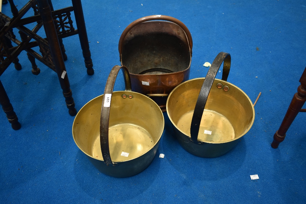 Two vintage jam pans and a copper coal helmet