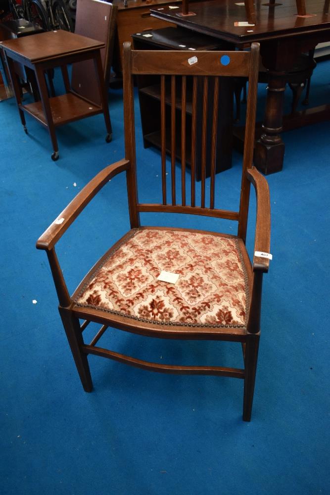 An Edwardian mahogany carver chair