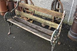 A vintage bench having cast ends