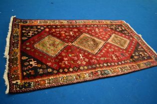 A Persian rug, approx 2.50 x 1.40 cm