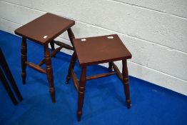 Two stained frame stools having turned legs