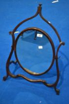 A 19th Century mahogany frame toilet mirror having shaped angled frame