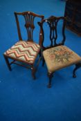 Two 19th Century dining chairs in the Georgian style having decorative backs