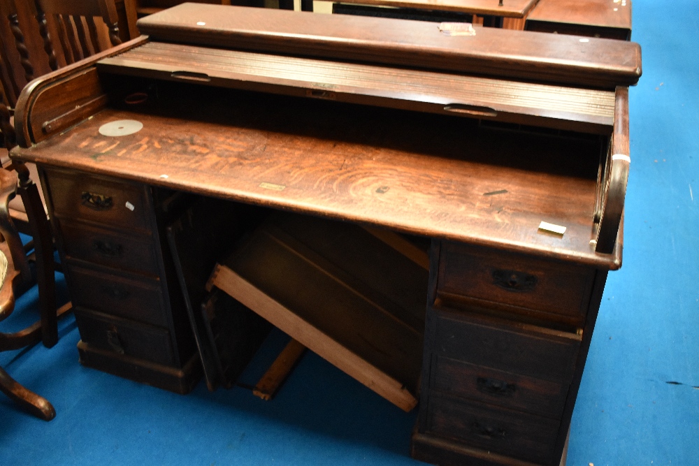 An early 20th Century roll top desk , dimensions approx. W151 D91 H98cm