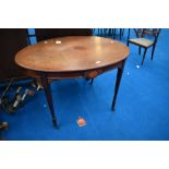 An Edwardian mahogany Sheraton style centre table of oval form having satinwood inlay decoration