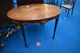 An Edwardian mahogany Sheraton style centre table of oval form having satinwood inlay decoration