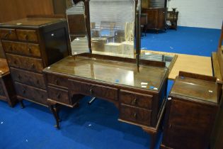 An early 20th Century mahogany and walnut three piece bedroom suite (no wardrobe)