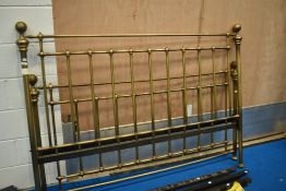 A Victorian style brass bed frame, having slat base