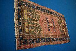 A Persian rug, labelled Eastern Kayam Co, Kolyai, approx 2.57 x 1.43cm