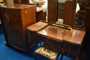 An early 20th Century mahogany and walnut two piece bedroom suite comprising dressing table with
