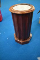 A 19th Century mahogany cylindrical pot cupboard with marble top