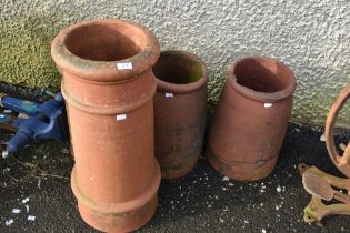 Four clay chimney pots