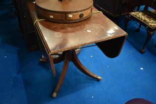A reproduction Regency style pembroke table