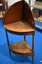 A 19th Century mahogany corner washstand or shelf, with faux drawers to both friezes