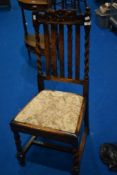 An early 20th Century oak rail back dining chair