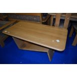 A modern light wood coffee table, of similar design to lots 629 & 630, approx. 129 x 70cm