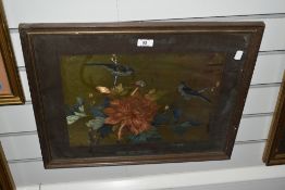 An Oriental metallic print depicting courting birds and blossom, framed and glazed.45cm x 55cm.