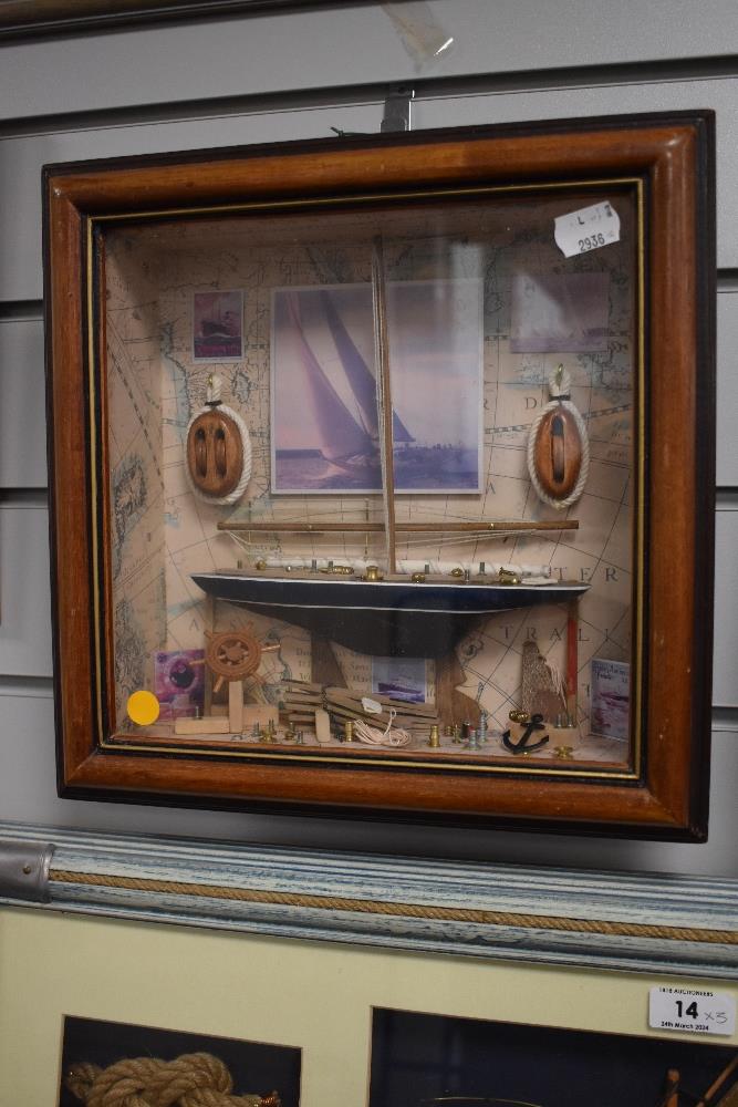 A decorative nautical themed box frame display, with small central half model boat, knot examples - Image 2 of 5