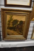 A 20th Century oil on board, A Country Cottage, mounted and framed within a wooden gilt frame 65cm x
