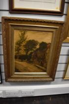 A 20th Century oil on board, A Country Cottage, mounted and framed within a wooden gilt frame 65cm x