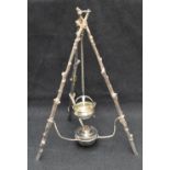 An unusual Victorian silver-plated spirit burner, formed as a rustic cooking tripod with the three