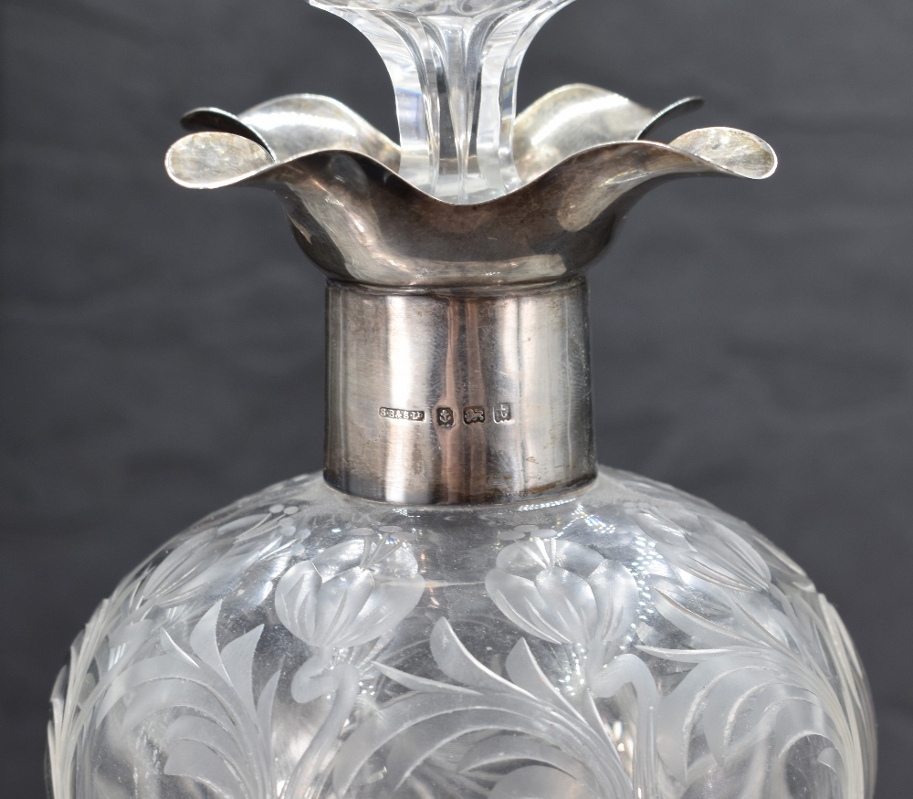 A George V silver mounted moulded and engraved glass 'Glug-Glug' decanter, having a foliate engraved - Image 2 of 3